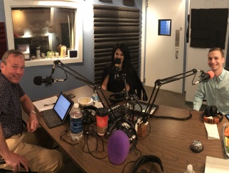 Sarween Salih (center) in the podcast studio with co-hosts Bill Thorne (left) and Tony Fontana (right)